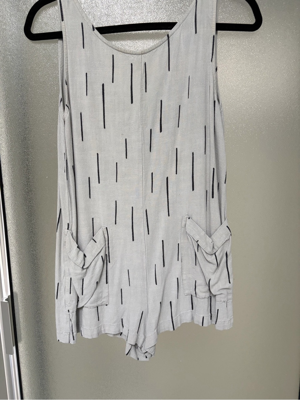 Sleeveless Light Gray Romper with Black Dash Print